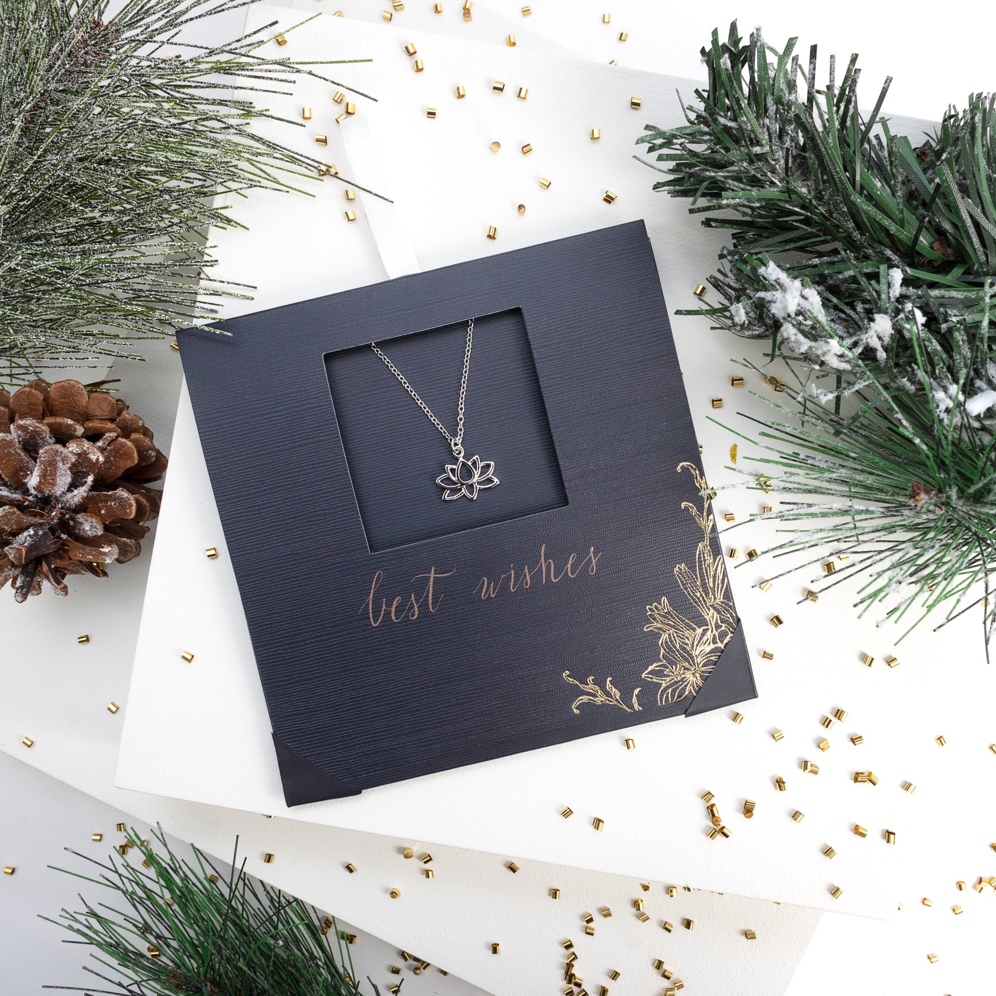 Lotus necklace with sparkling CZ pendant, stainless steel chain, gift-ready design by callura