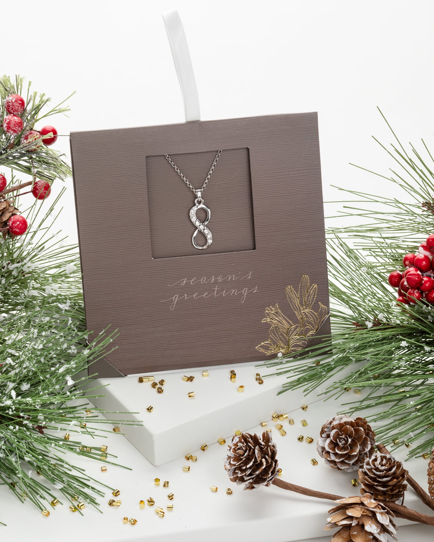 Silvertone   Clear Swarovski Crystal Infinity Necklace - on Holiday Card