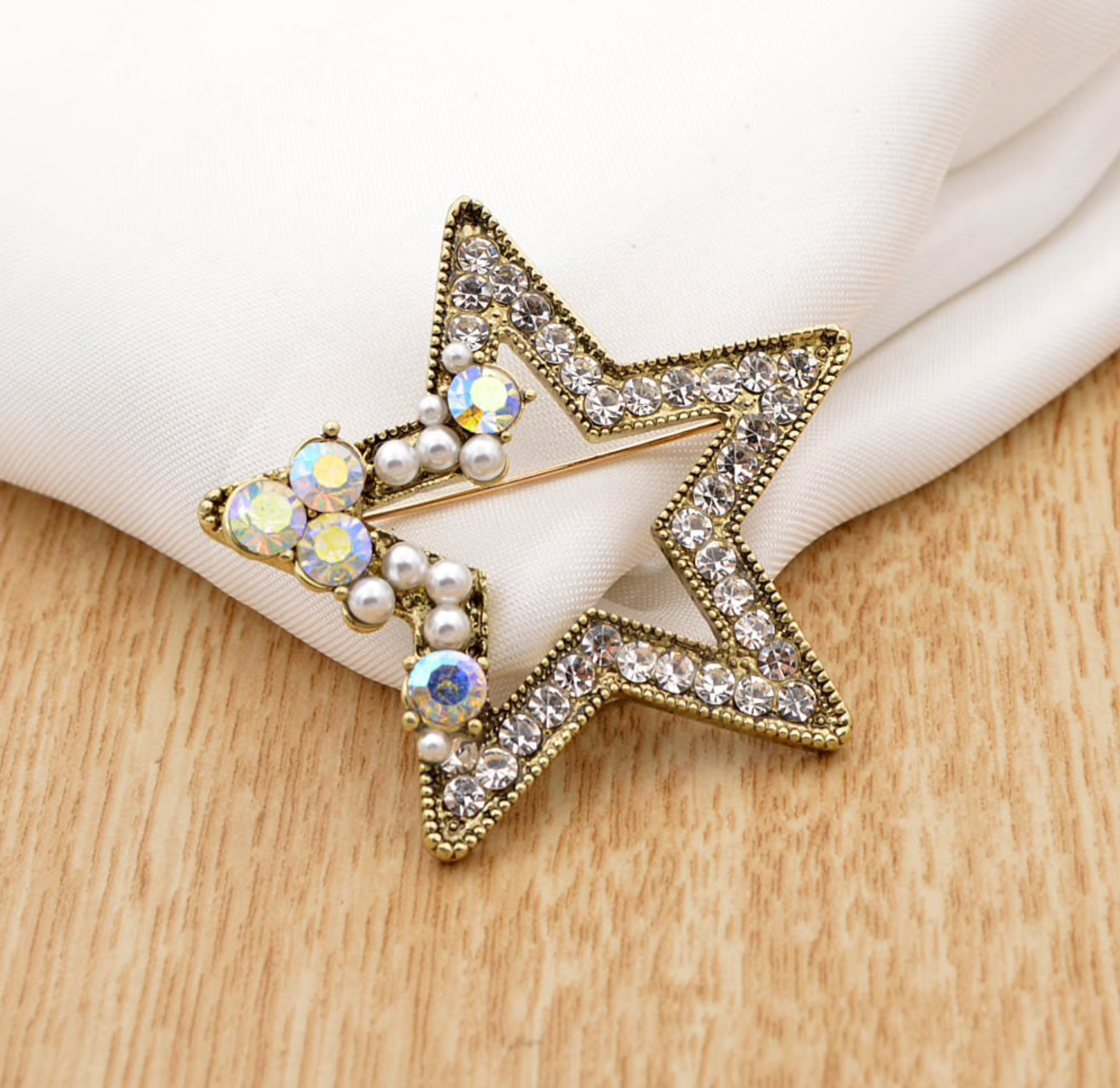 Goldtone & Crystal Open Star Brooch