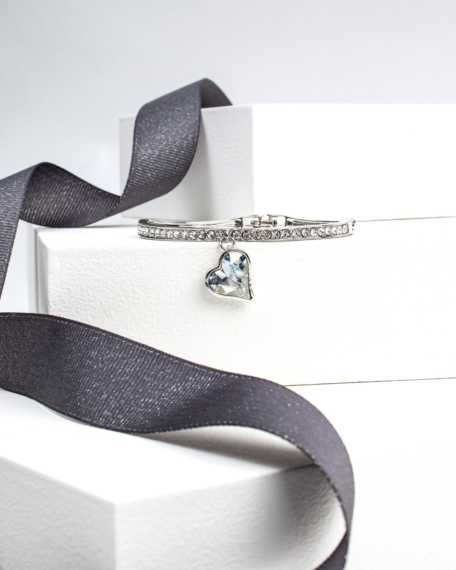 Crystal Pave Bangle with Blue Shade Heart Charm