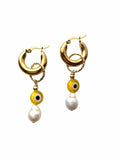 BOUCLES D'OREILLES PERLE YEUX JAUNES