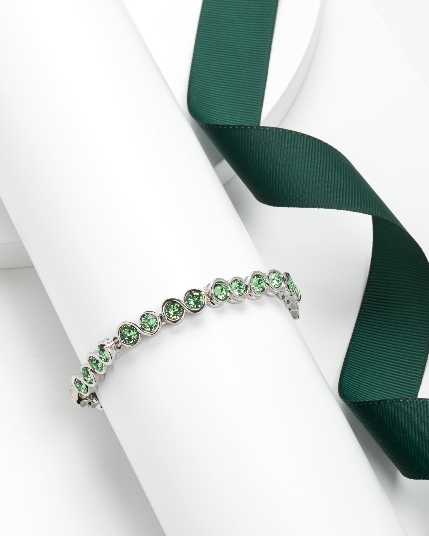 Silvertone & Peridot Swirled Crystal Tennis Bracelet